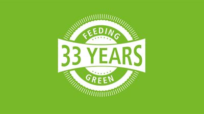 Logo 33 years feeding green