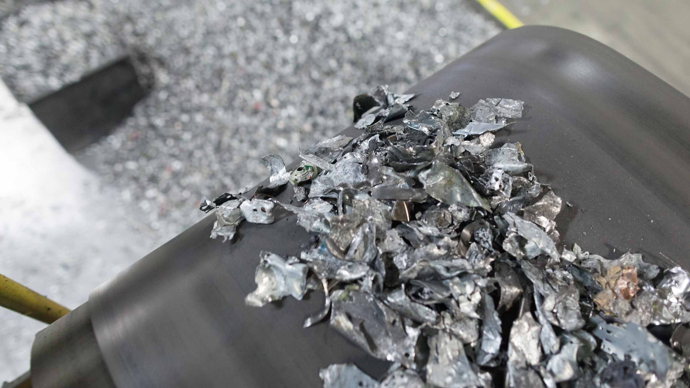 Battery metal scraps on band Battery metal scraps on band