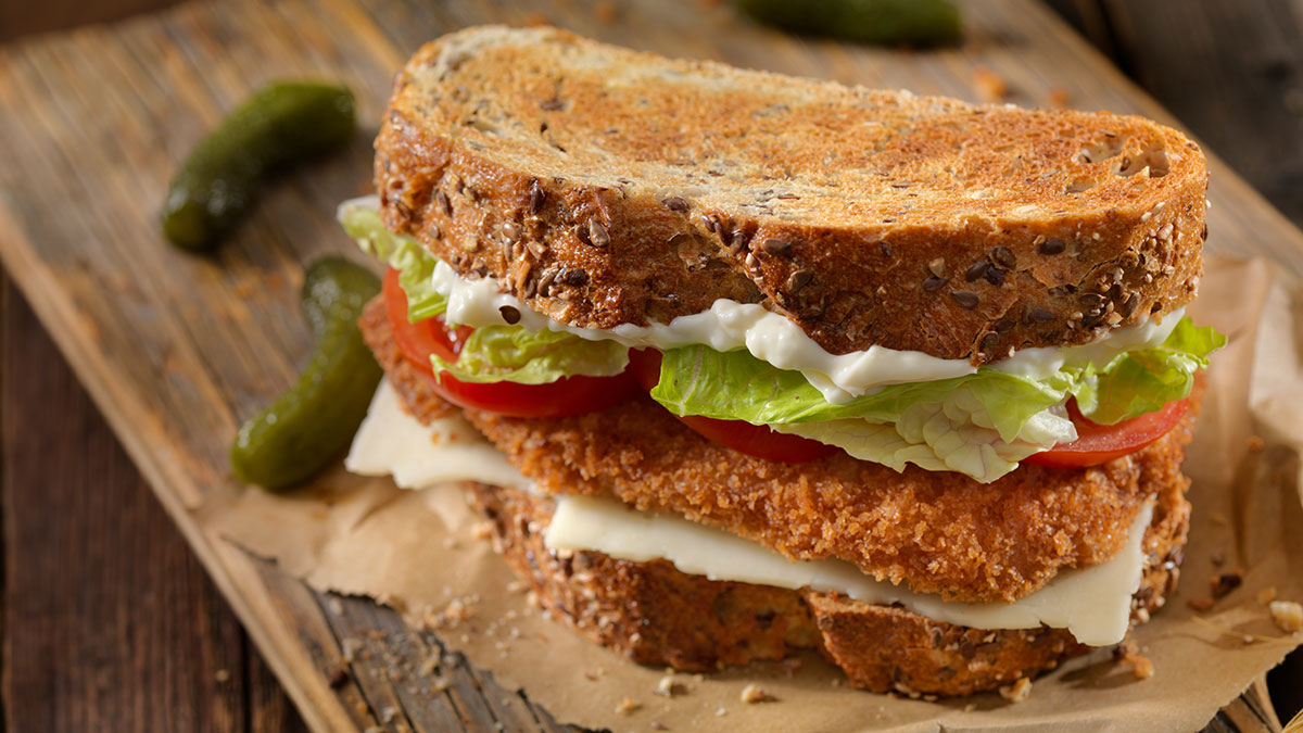 Processed meat coated schnitzel