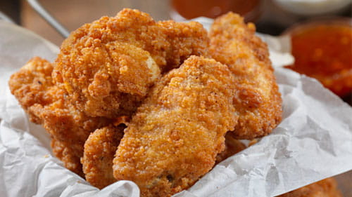 Coated poultry - flour coated chicken wings