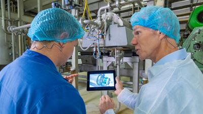 Michel Hörster, Emsland Group (left), and Martin Neugebauer, GEA (right), discuss the decanters for processing potato protein at the plant in Kyritz. The Emsland Group previously chose to partner with GEA in 2018 for the construction of its new protein line at this plant. (Image: GEA)