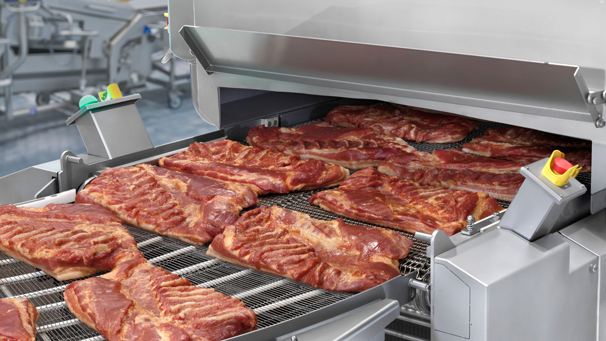 Cookstar 1000 Gen 3 outfeed with smoked bacon bellies