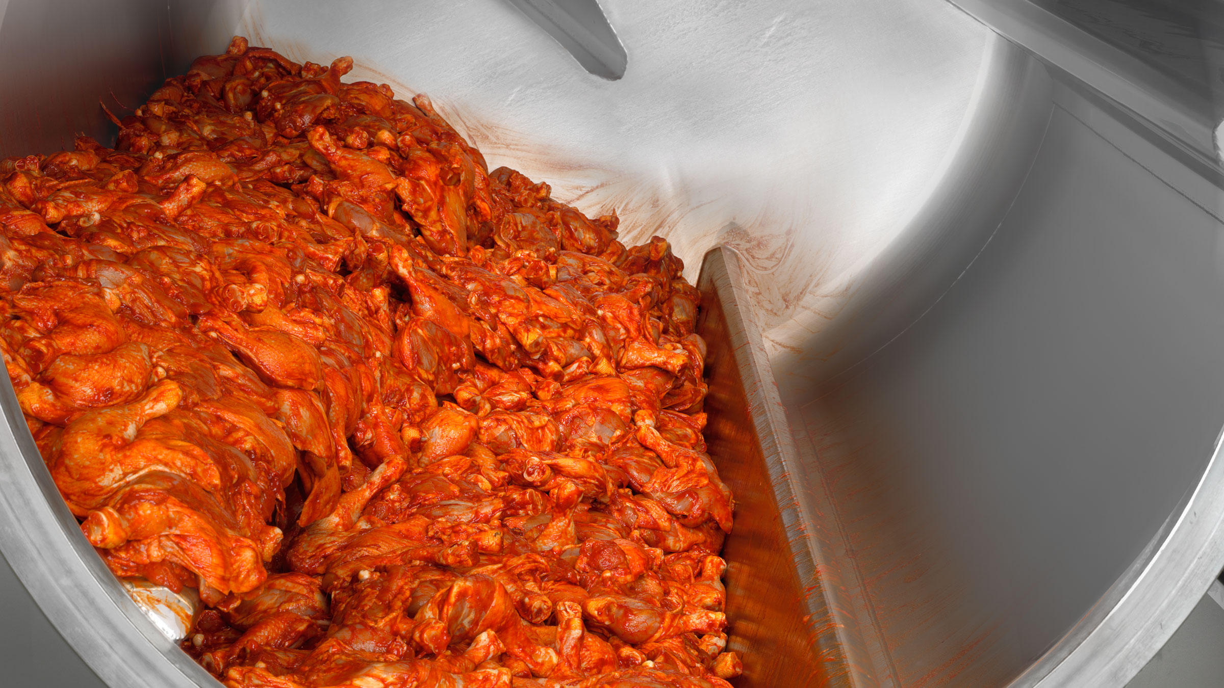 GEA ScanMidi tumbling & massaging system in use with marinated chicken legs