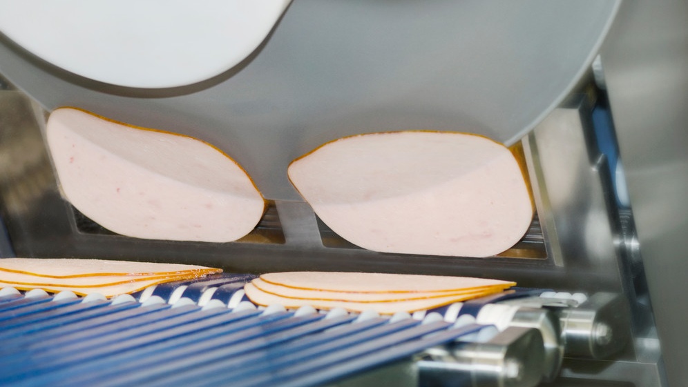 GEA MegaSlicer in use raw ham